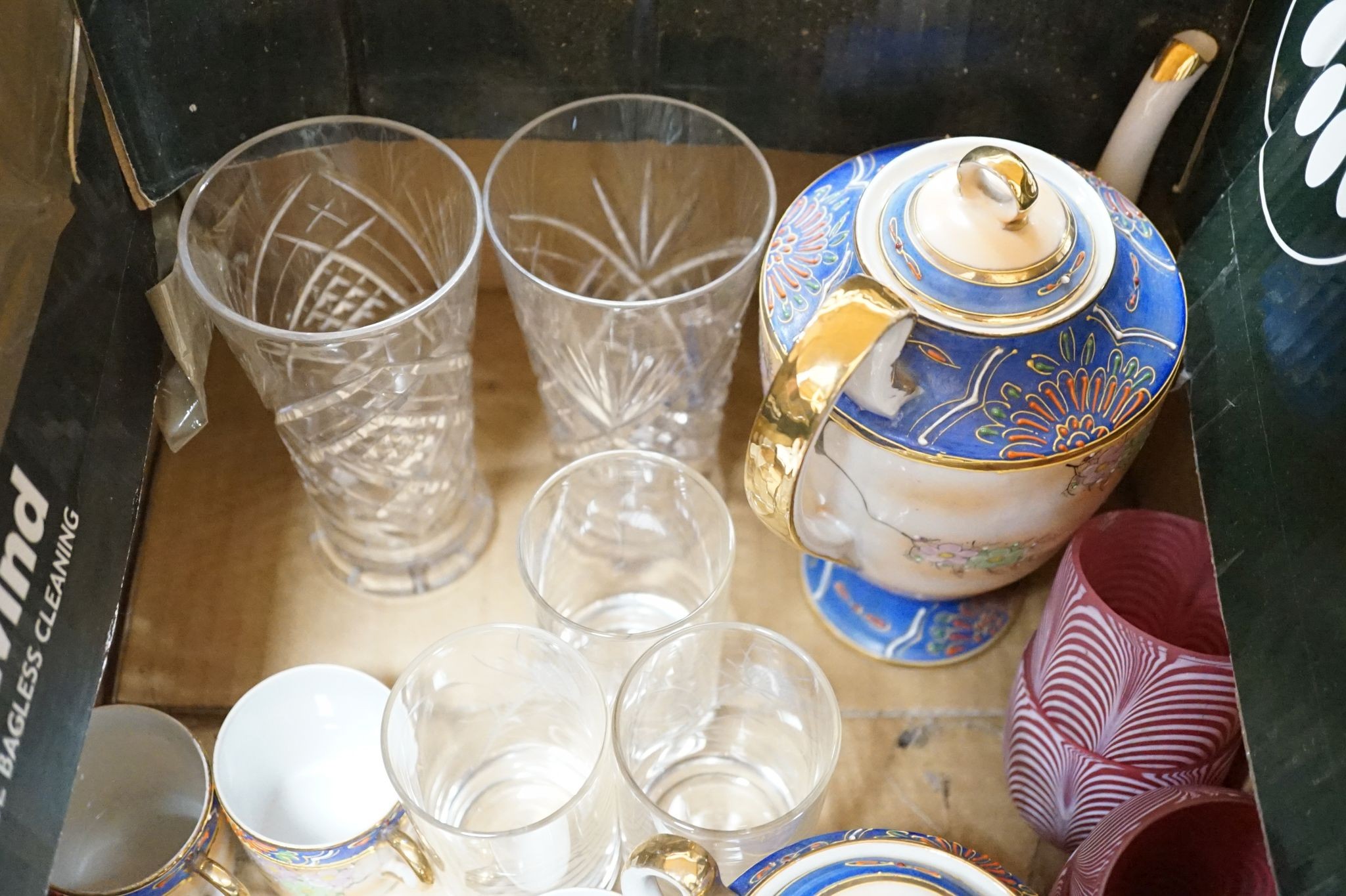 A collection of French provincial plates, various cut glass wine glasses and a Japanese Imari bowl.